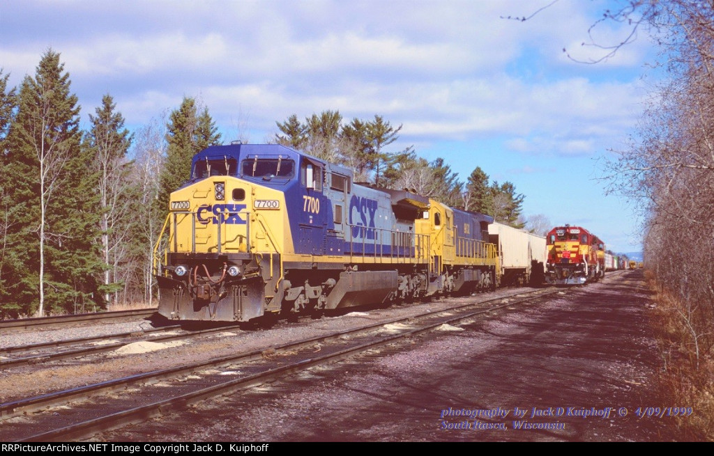 CSX C40-8W 7700- LRCX ex-Santa Fe SF30-C 9532, is about to head south on the Wisconsin Central at South Itasca, Wisconsin. April 9, 1999. 